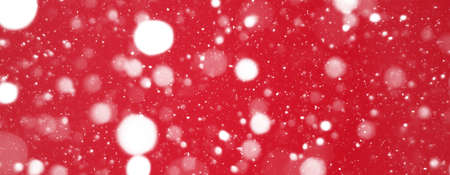 Banner, christmas snowfall on red background, copyspaceの写真素材