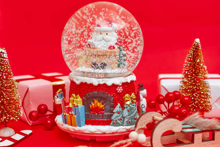 Christmas composition, gifts on red background, copyspaceの写真素材