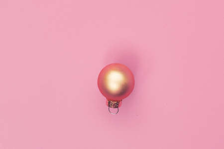christmas ball on pink background isolate, copyspace, layoutの写真素材