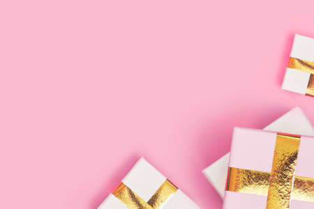 christmas gifts on a pink background, copyspace, layoutの写真素材