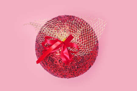 christmas ball on pink background isolate, copyspace, layout