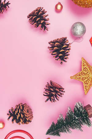 christmas frame made of decorations on a pink background isolate, copyspace, layoutの写真素材