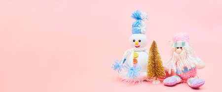 Banner christmas decoration on pastel pink background, copyspaceの写真素材