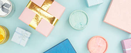 gift boxes on blue pastel background, copy space, Flatlay
