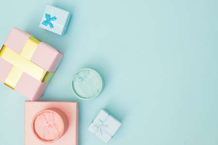 gift boxes on blue pastel background, copy space, Flatlay