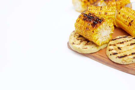 grilled corn vegetables on a white background, copy space, flatlay