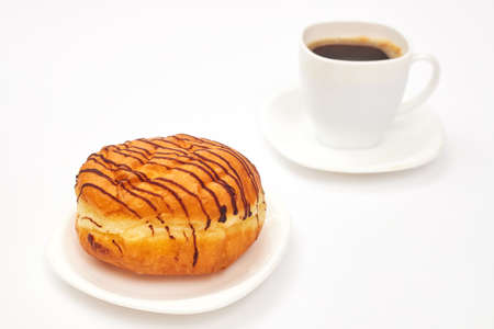 chocolate donut and coffee cup on white background isolate, copy spaceの写真素材