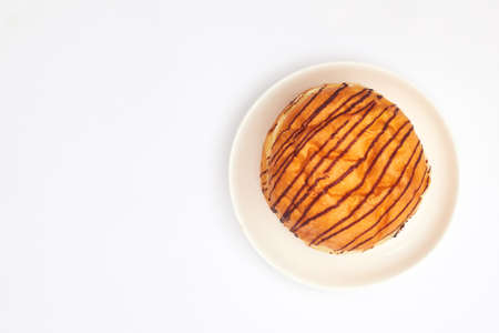 chocolate donut on white background isolate, copy space, top viewの写真素材