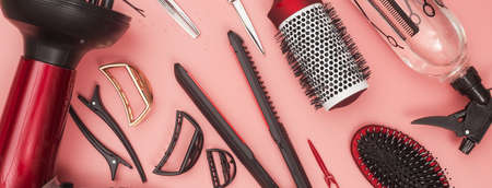 professional items for hairdressing, haircuts on a pink background, layoutの写真素材