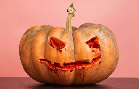 halloween pumpkins on pink background copy spaceの写真素材
