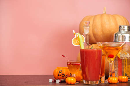 halloween bar cocktails party on pink background copy spaceの写真素材