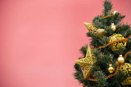 Christmas background, card, Christmas tree on pink backgroundの写真素材