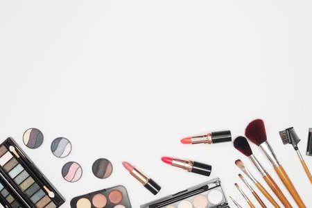 set of professional cosmetics, makeup tools and accessories on white background, beauty, fashion, shopping concept, flat layの写真素材