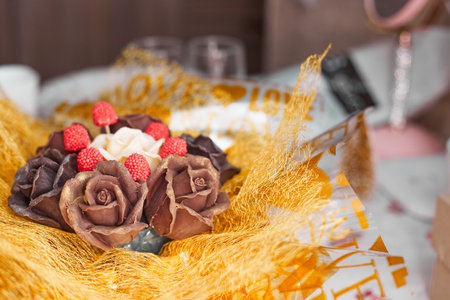 valentines day concept, chocolate bouquet of roses in gold packaging, copy spaceの写真素材
