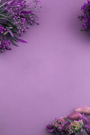 purple background with flowers vertical orientationの写真素材