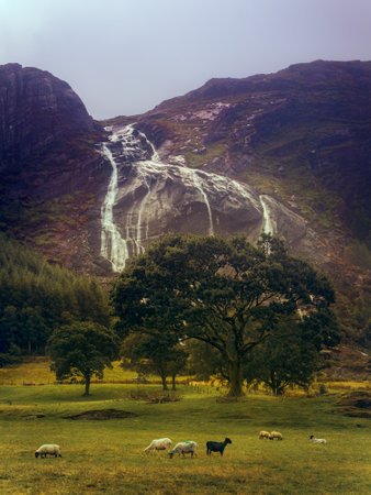 Ring of Beara, near Kerry, Ireland. natural landscape with large waterfall coming down from the...
