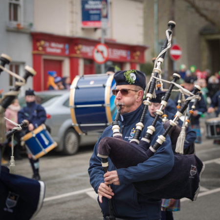 NEW ROSS - WEXFORD- IRELAND - MARCH 17-2018 St. Patrick's Parade. people and musicians enjoying the traditional Irish holidayのeditorial素材