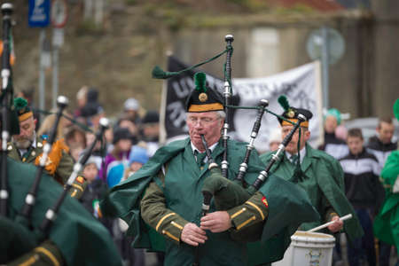 NEW ROSS - WEXFORD- IRELAND - MARCH 17-2018 St. Patrick's Parade. people and musicians enjoying the traditional Irish holidayのeditorial素材