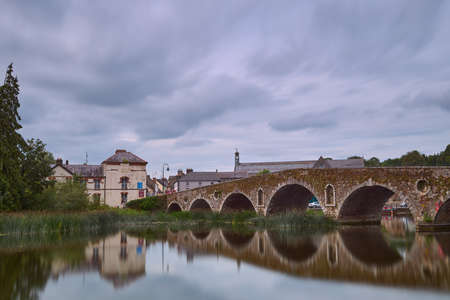 Graiguenamanagh - IRELAND - JUL 07-2021 long and old bridge over the Barrow River.のeditorial素材