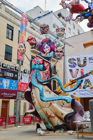 Valencia, Spain - Mar 13, 2023: Seventies themed paper for the national festival Fallas.のeditorial素材