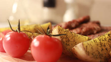 tomato with Baked potatoes and meatの写真素材