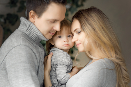 Portrait of young happy couple expecting a baby.の写真素材