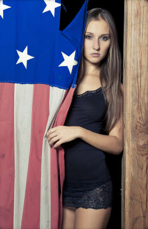 sexy young girl with american flagの写真素材