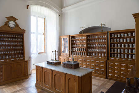 Empty chemical bottles in old vintage pharmacy