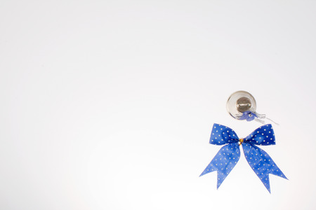 Blue bow isolated on white の写真素材