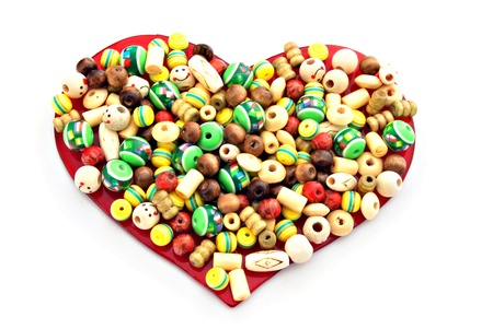 Beaded heart isolated on white background の写真素材