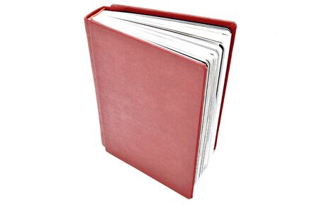 Red book isolated on white backgroundの写真素材