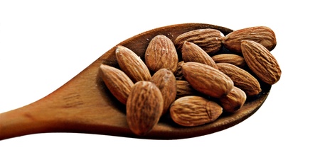 Spoon almond isolated on white backgroundの写真素材