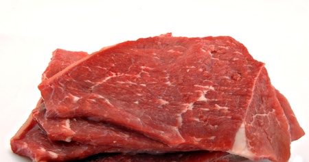 Fillet of beef in red stacked atop one anotherの写真素材