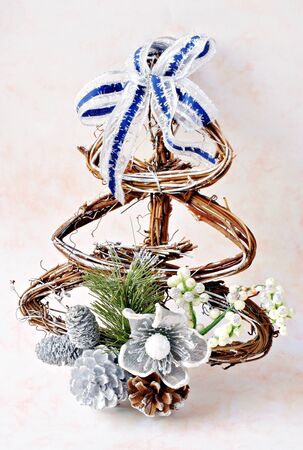 Christmas Ornament with various ornaments on pink background blurの写真素材