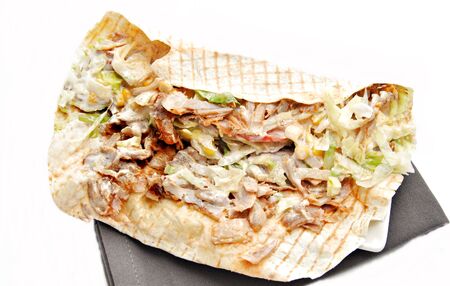 Mexican omelette  with salad and meat inside, served on a plateの写真素材