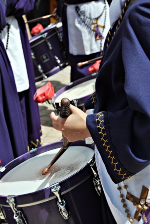 People playing the drums during a Holy Week procession in Spainの写真素材