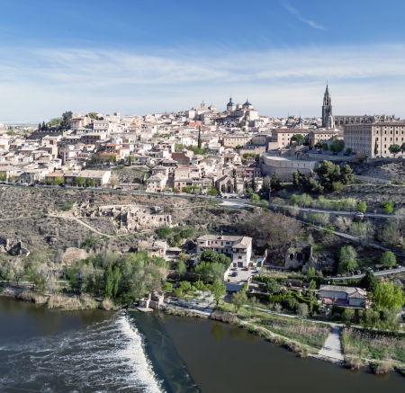 Distant view of the the Spanish city of Toledo, in one side the river tagus, in the bacjground the medieval city of Toledo with its monasteries and medieval housesのeditorial素材