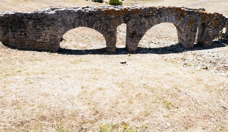 Roman aqueduct located in the ruins of Baelo Claudia in the Spanish province of Cadizの写真素材