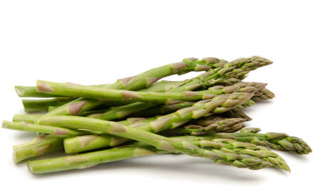 Delicious fresh green asparagus on white backgroundの写真素材