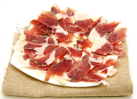 Aperitivo de jamón en rebanadas delgadas? Típica de Españaの写真素材