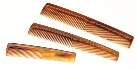 Several combs on white backgroundの写真素材