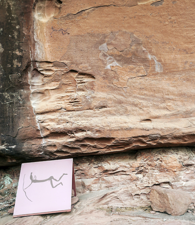Rupestrian paintings located in the Sierra de albarracin in the spanish province of Teruel is an archer with arrow, is a picture verticallyの写真素材