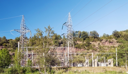 Castejon power plant from sos in the Spanish province of Huesca. Turrets are surrounded by trees on...