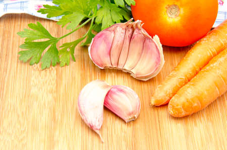  Vegetables on a wooden boardの写真素材