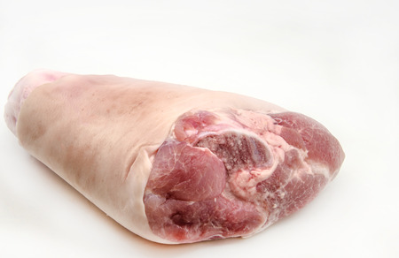 Knuckle raw pork meat on white backgroundの写真素材