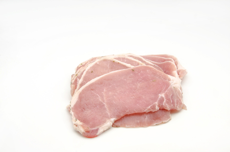 Fresh raw pork surrounded by white backgroundの写真素材