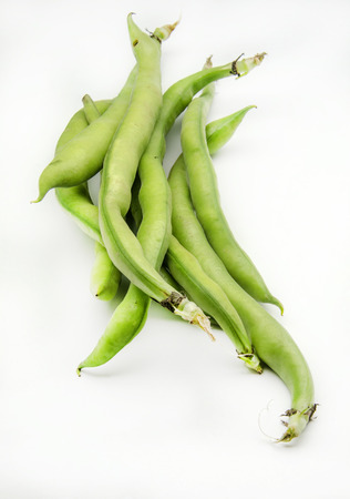 Several raw beans surrounded by white backgroundの写真素材