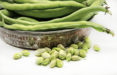 Several raw beans surrounded by white backgroundの写真素材