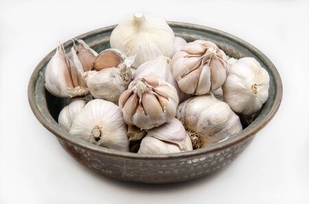 Several raw garlicの写真素材