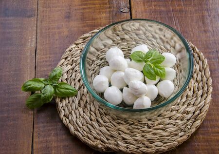 Mozzarella cheese balls served in a bowlの写真素材